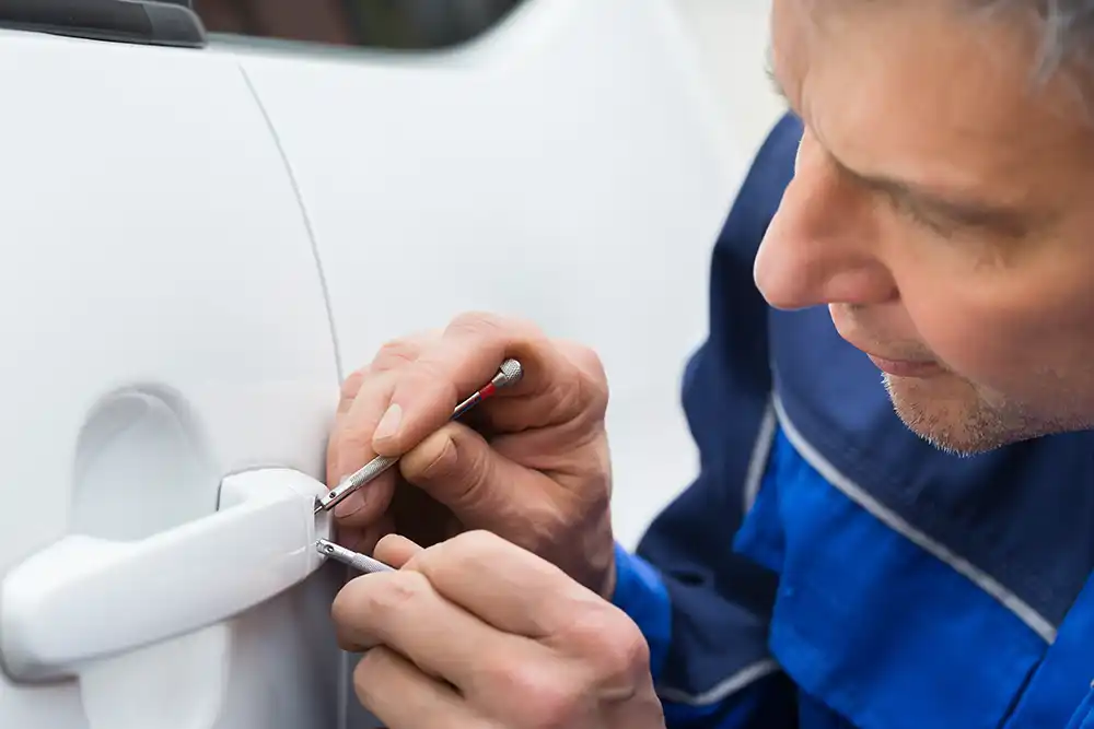 Professional Parker, TX locksmith opening a car lock