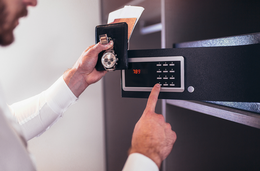 person opening a safe