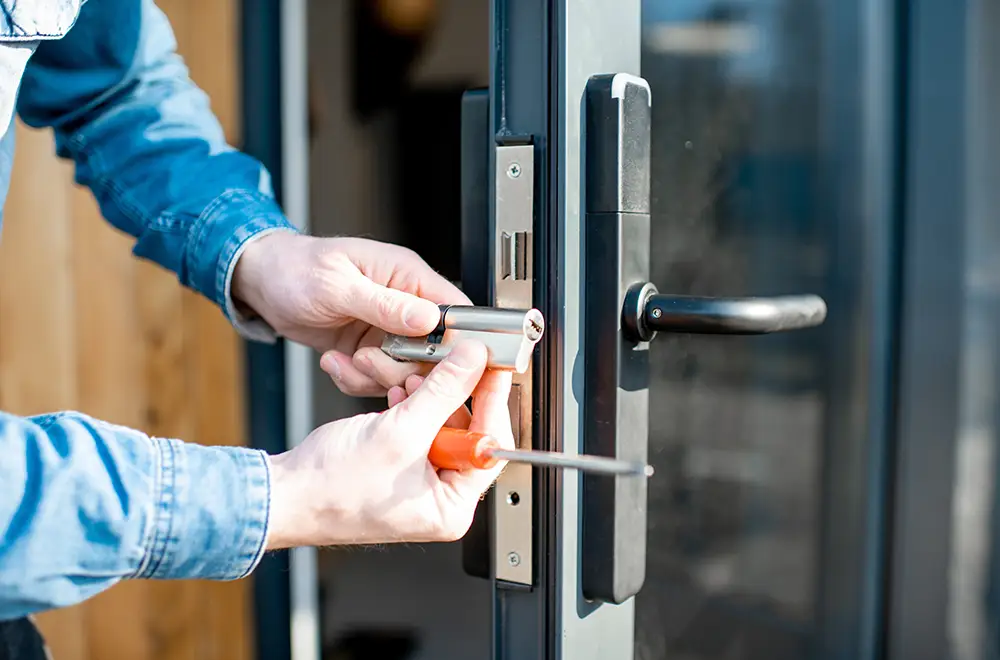 a locksmith fixing a lock